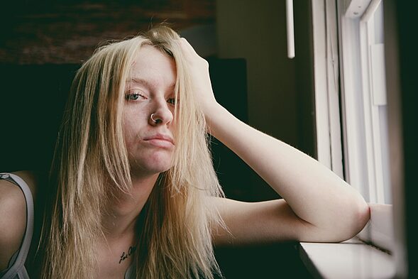 woman in black tank top, Unveiling the Risks of the Indoor Lifestyle - The Rise of Sedentary Lifestyles and Mental Health Consequences of Indoor Generation