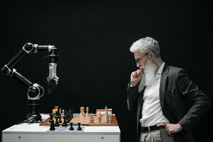 20 Helpful AI Innovations in 2024, Elderly Man Thinking while Looking at a Chessboard